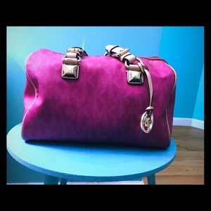 A Fusion pink one of a kind Michael Kors bag